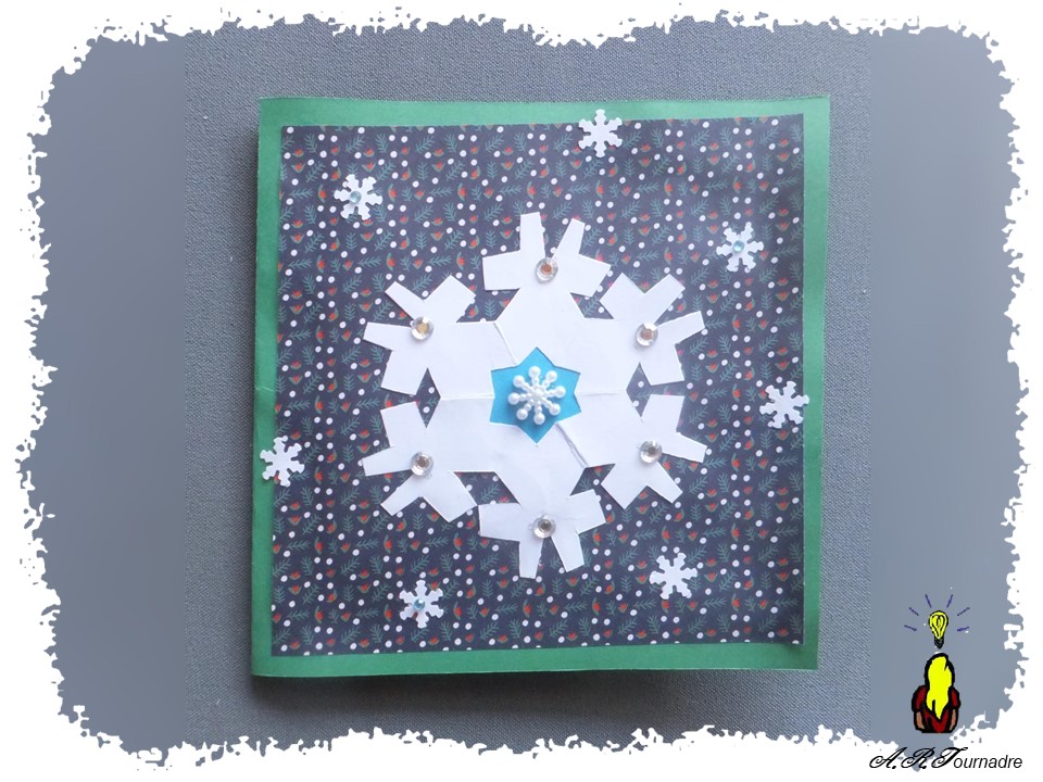 ART 2026 01 flocon kirigami 1 flocon de neige kirigami découpé aux ciseaux